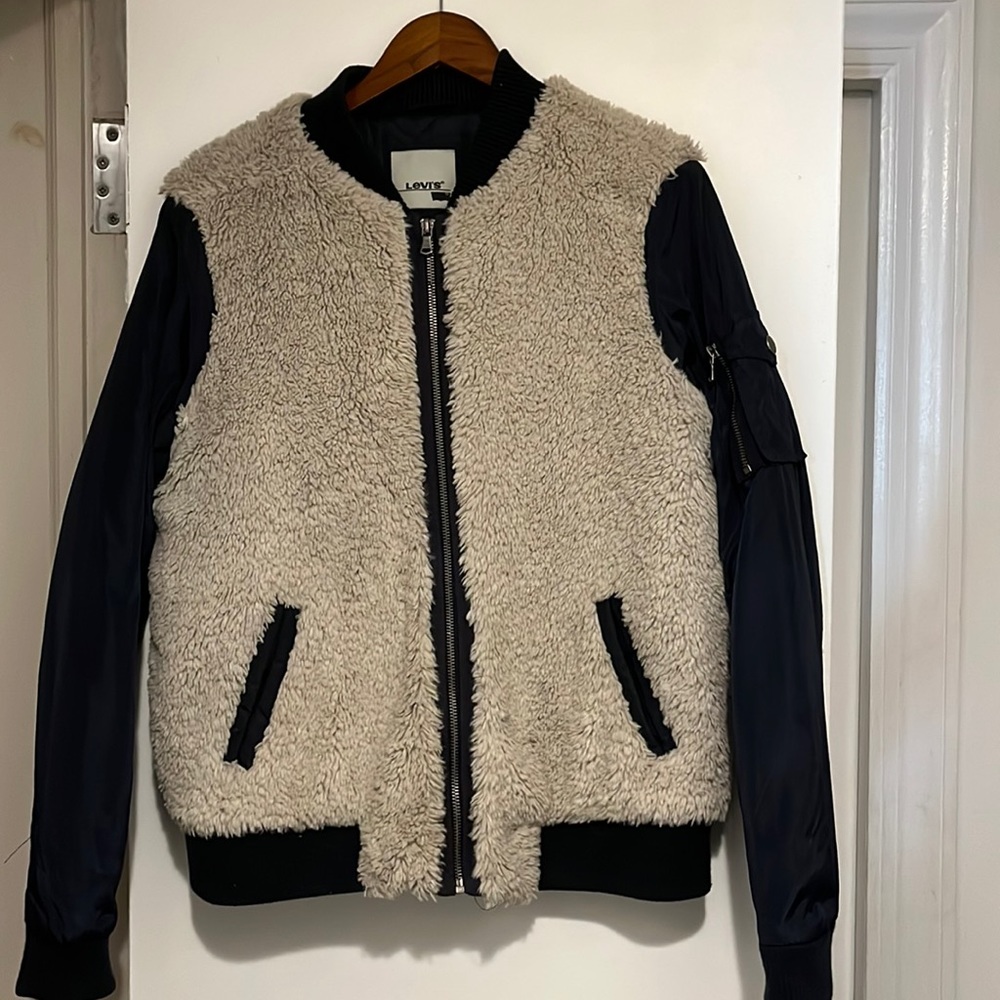 Levi’s bomber jacket, navy blue nylon with off-white fleece. Medium